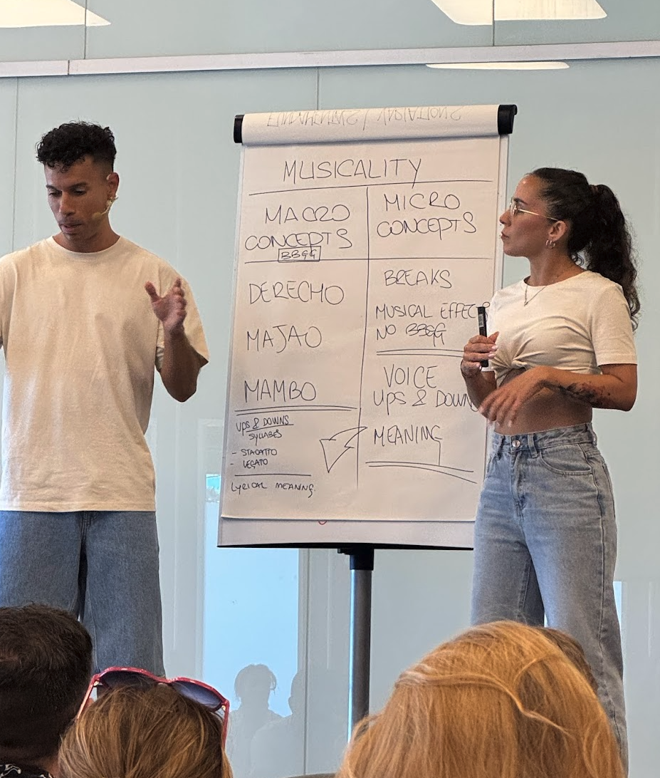 Workshop session from the 2025 edition with two teachers explaining musicality